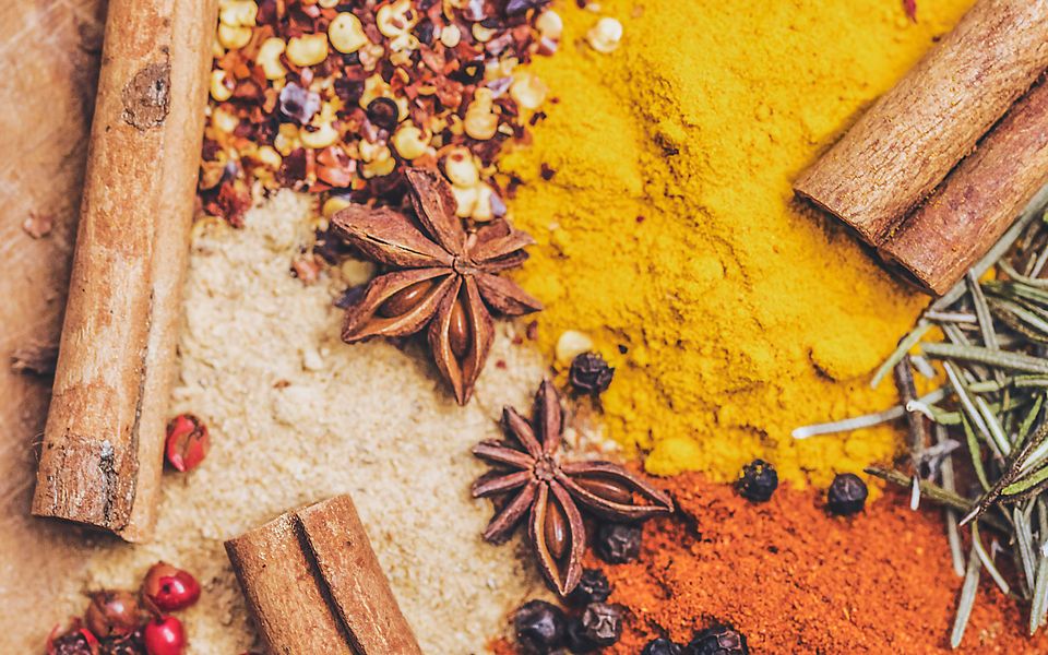 Indian spices including turmeric, chilli and cinnamon in bulk